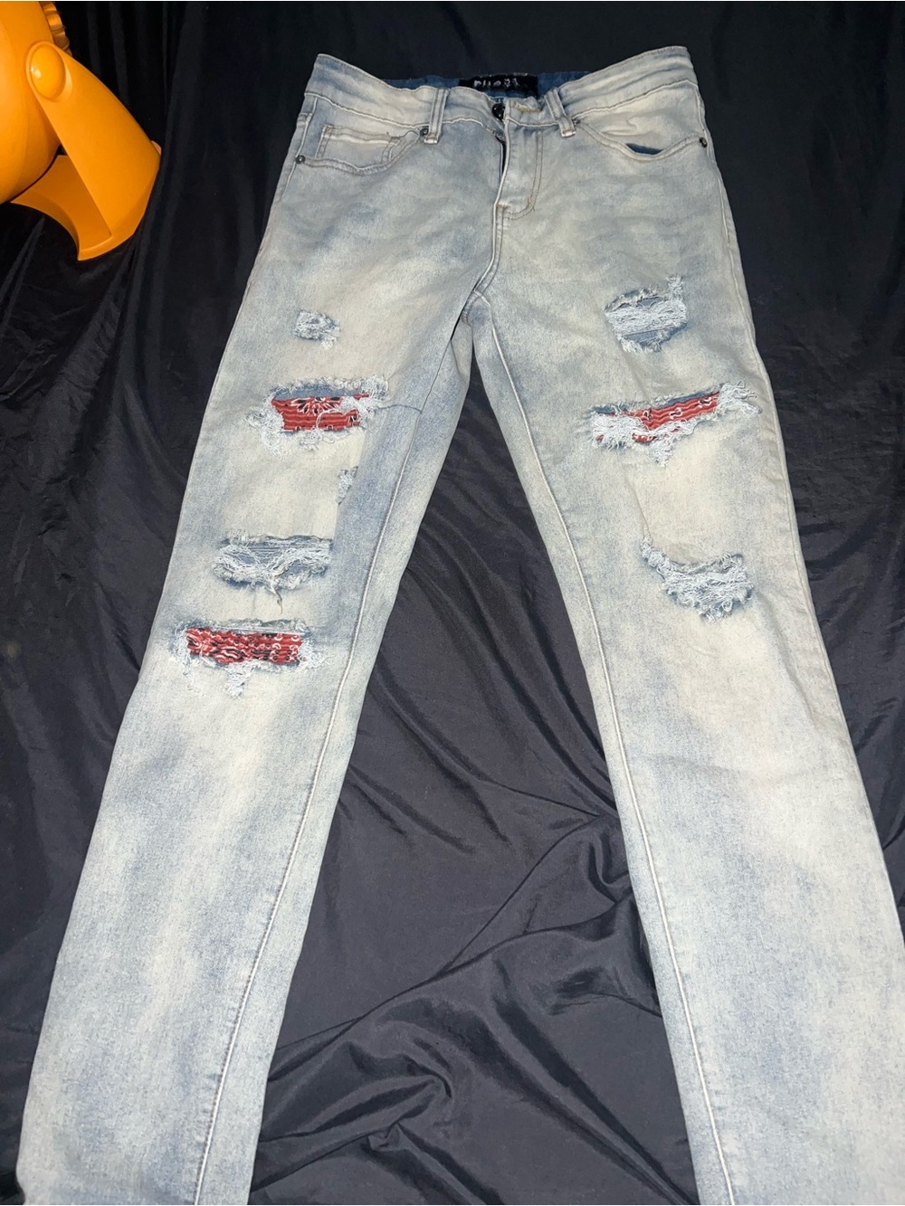 Rue21 Light Wash Skinny Jeans with Red Patch Distress
